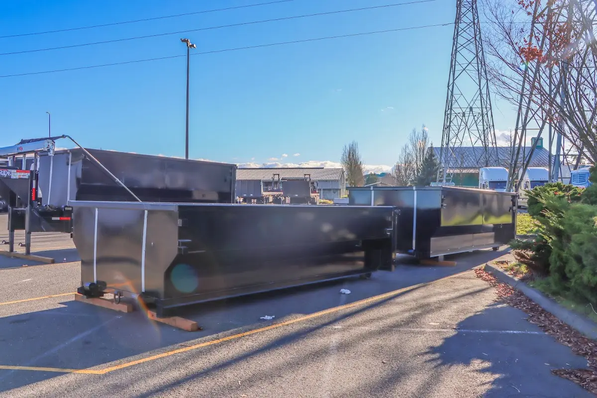 Roll-off dumpster ready for waste disposal at job site for Construction Dumpster Rental in Bull Mountain